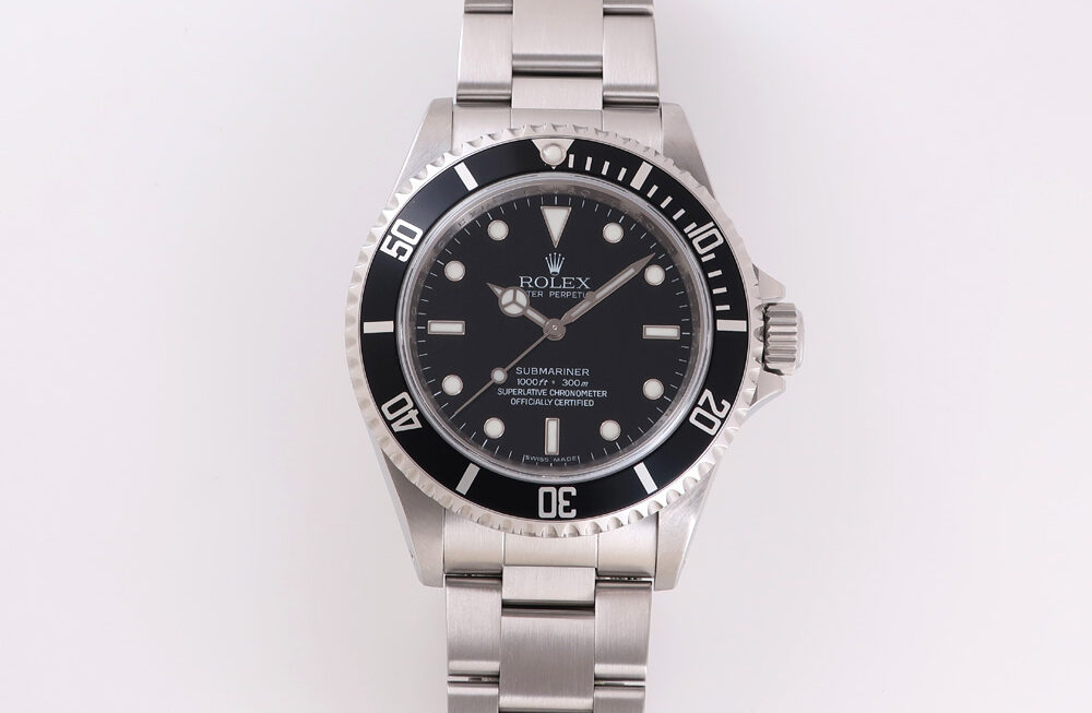 タグ類やベゼルカバーが付属した良コンディション個体！